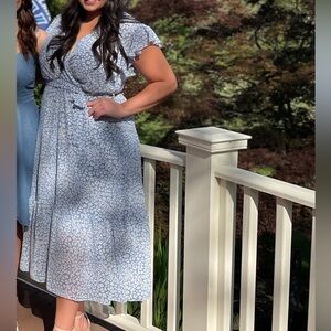 Blue floral print wrap dress